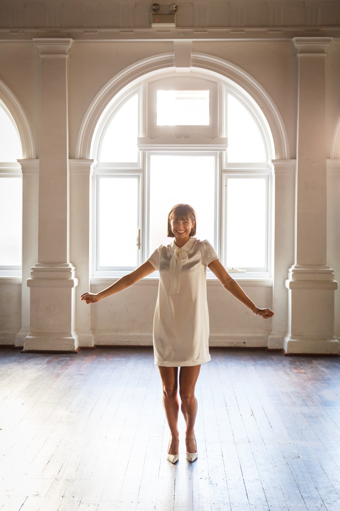 Blackbird dress shown in front profile while dancing